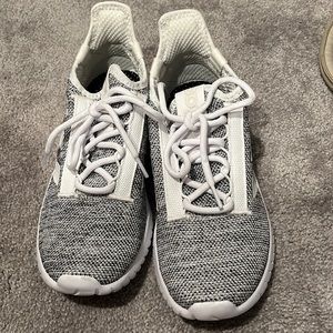 Grey and white Adidas running shoes